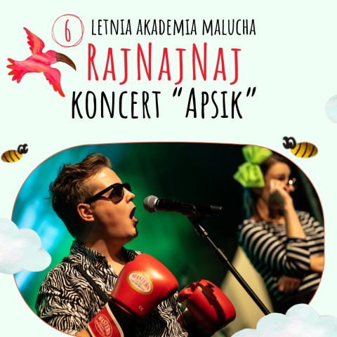 koncert apsik, na pierwszym planie śpiewający mężczyzna z rękawicami bokserskimi