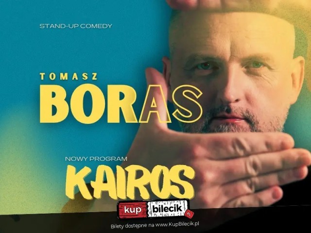 Tomasz Boras Kairos mężczyzna patrzy przez dłonie