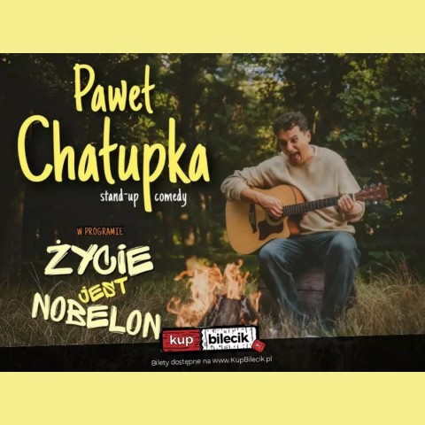 stand-up comedy, Paweł Chałupka w programie życie jest nobelon. Facet z gitarą przy rozpalonym ognisku.